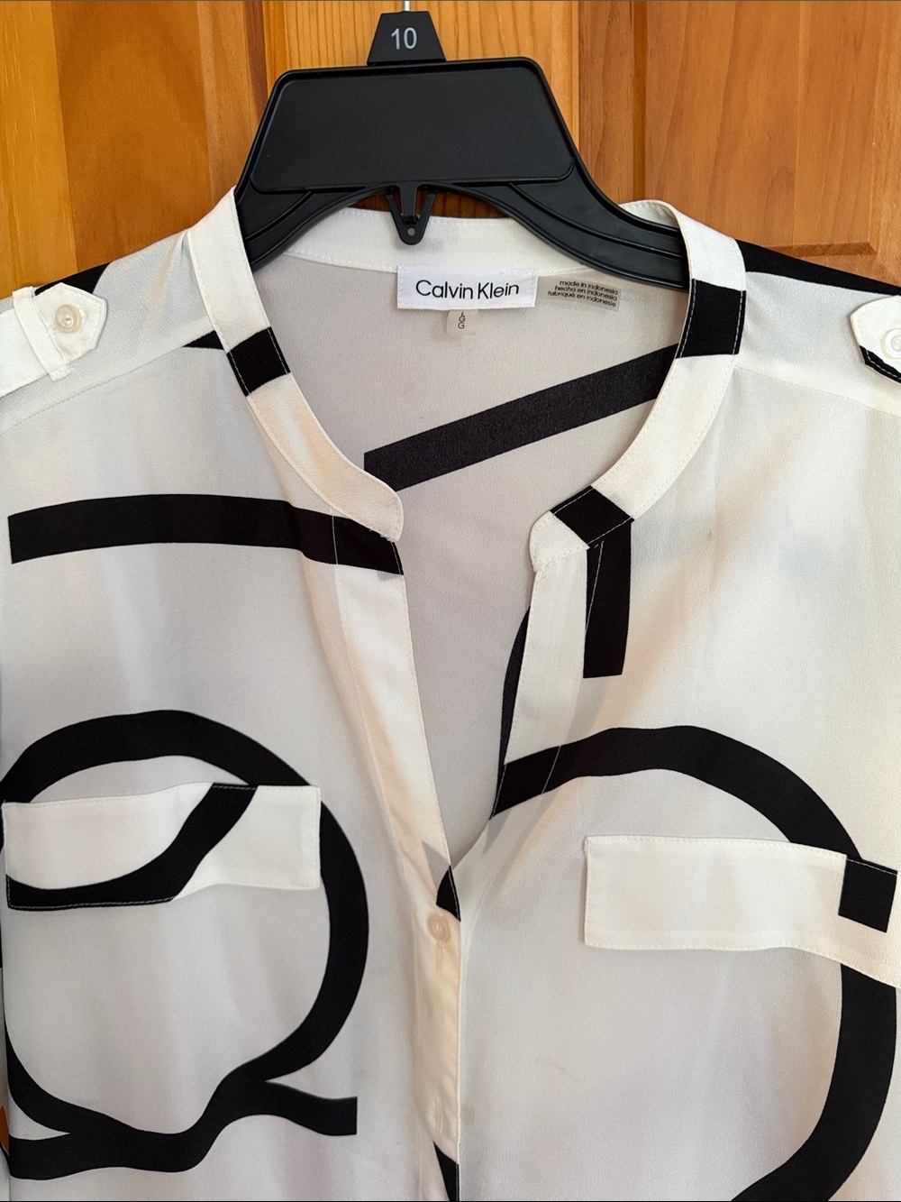Calvin Klein women’s black and white blouse. - Picture 2 of 2